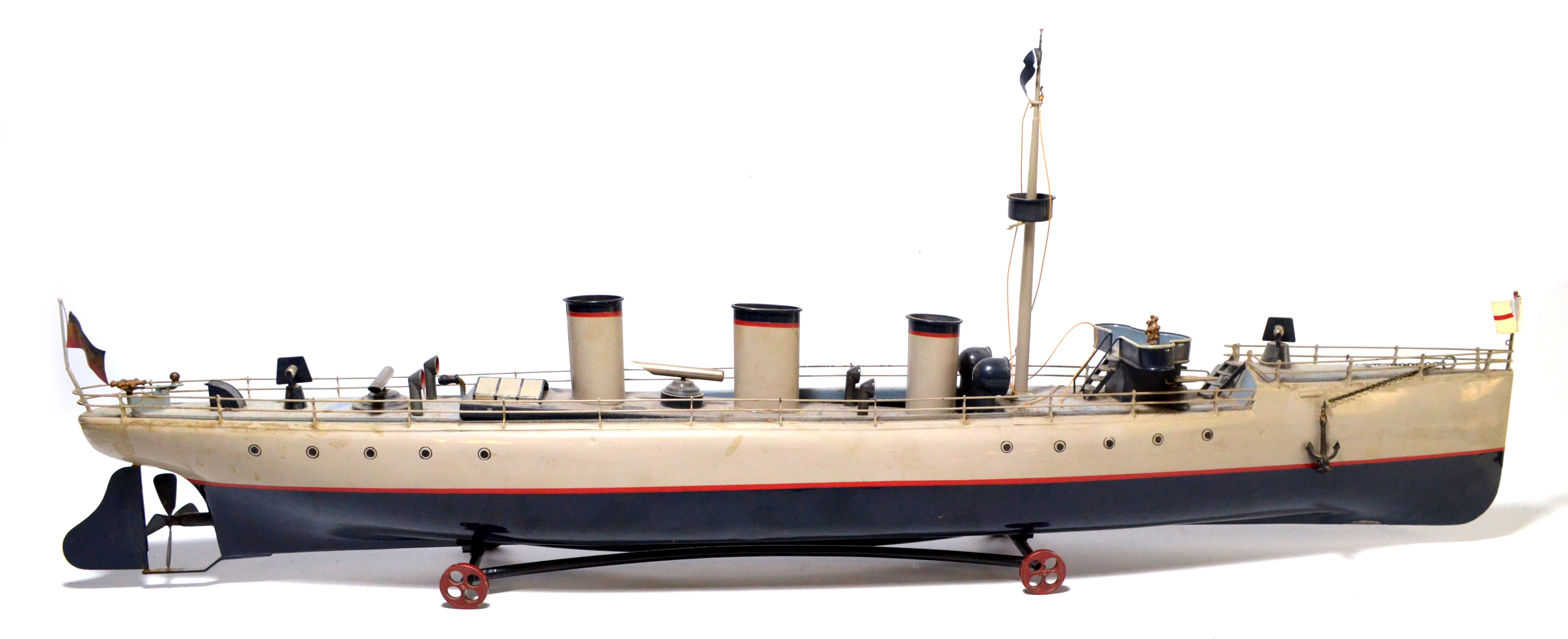 An early 20th century German Bing tinplate clockwork model of a torpedo ship.
