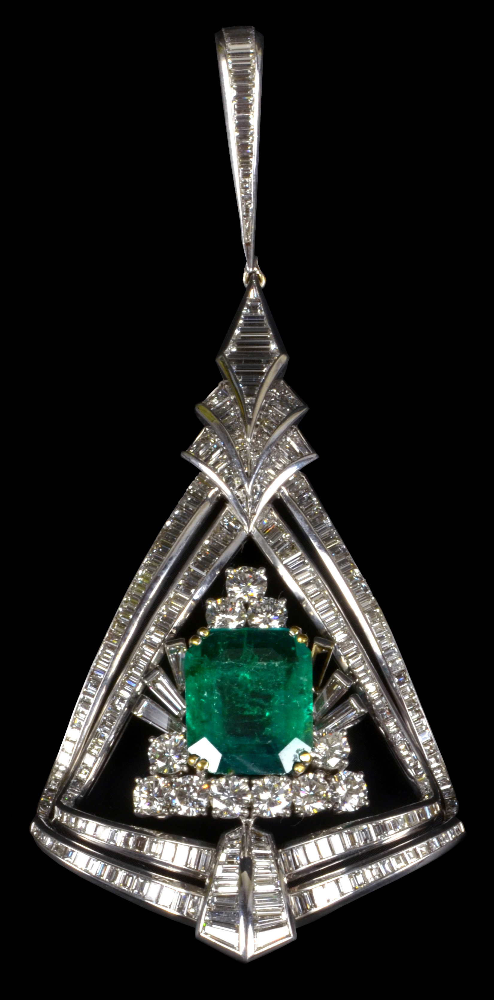 A large and impressive 18ct white gold diamond and emerald pendant.