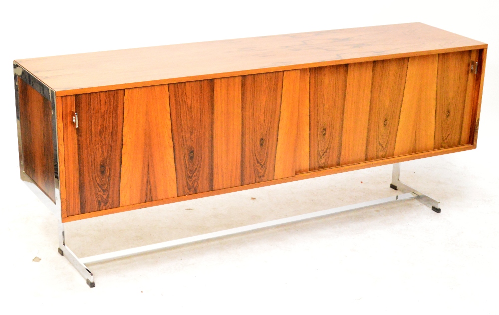 RICHARD YOUNG FOR MERROW ASSOCIATES; a 1970 rosewood veneered and chrome sideboard.