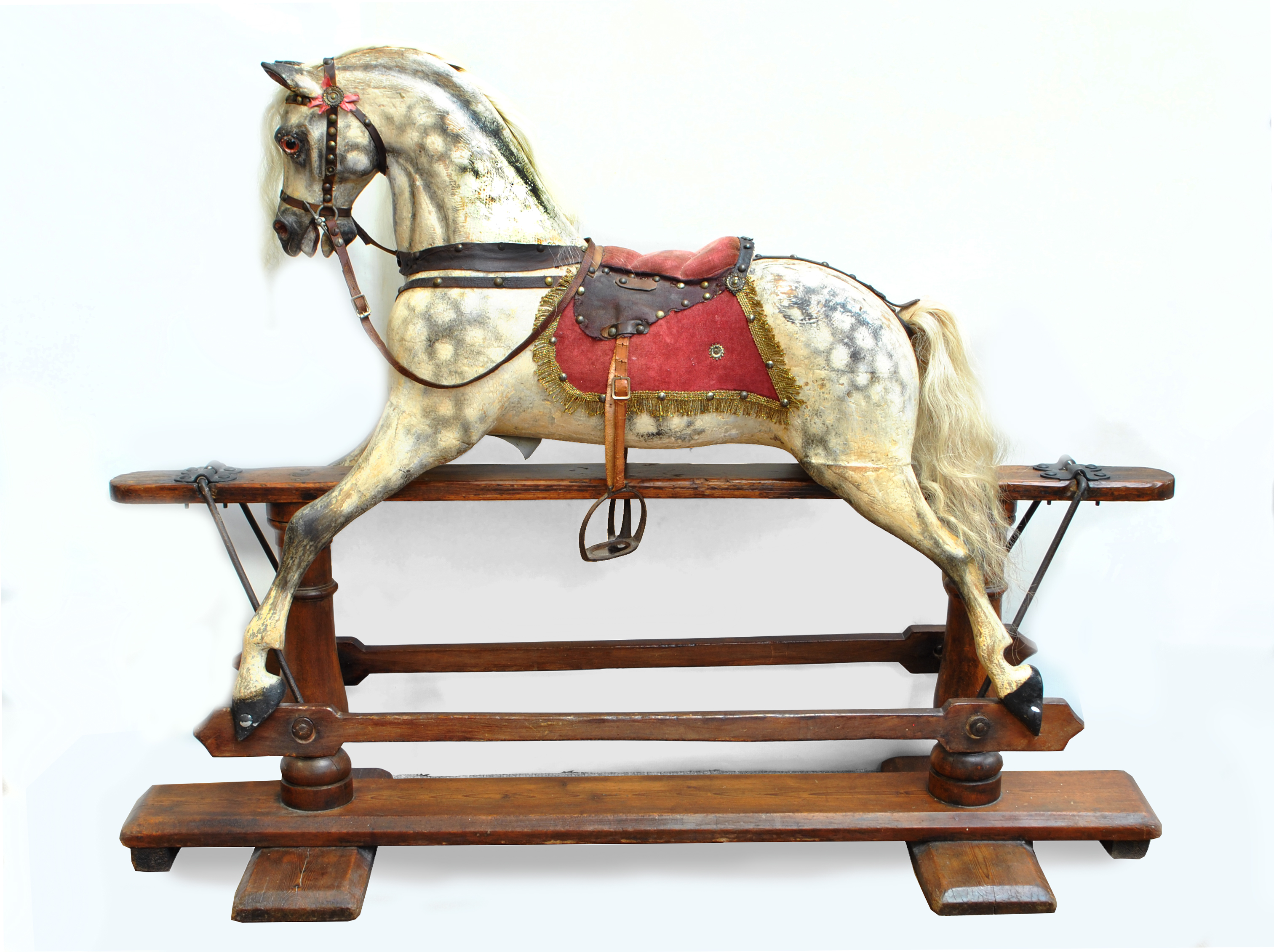 FH AYRES OF LONDON; a good and rare swivel head rocking horse in dappled grey with white mane.