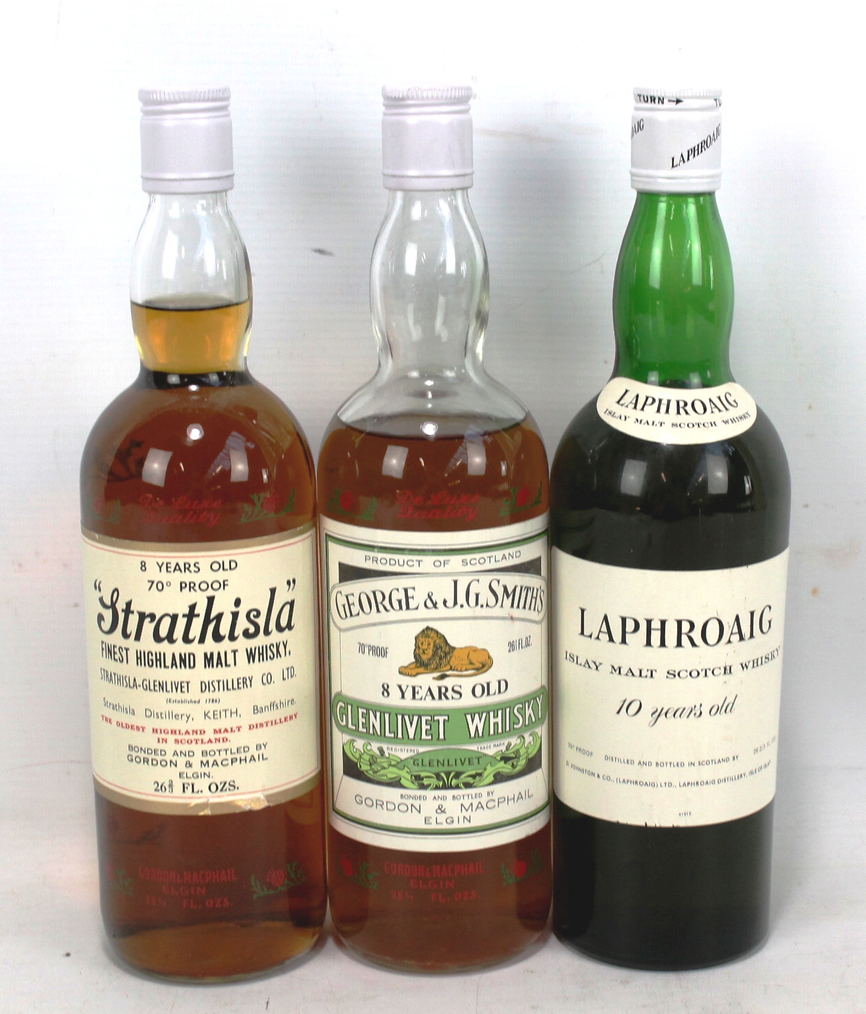 Three bottles of Scotch whisky.