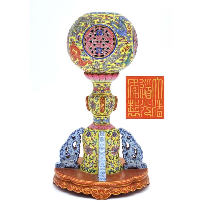 A Chinese porcelain enamel decorated yellow ground wig stand, Daoguang mark and period.