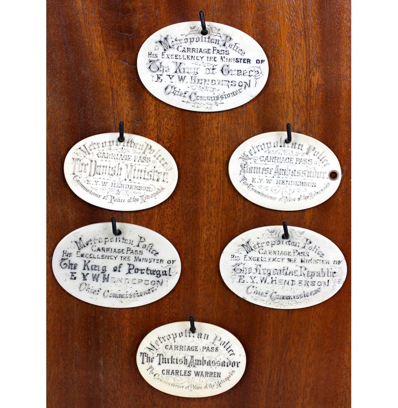 An unusual group of six 19th century ivory carriage pass tokens.