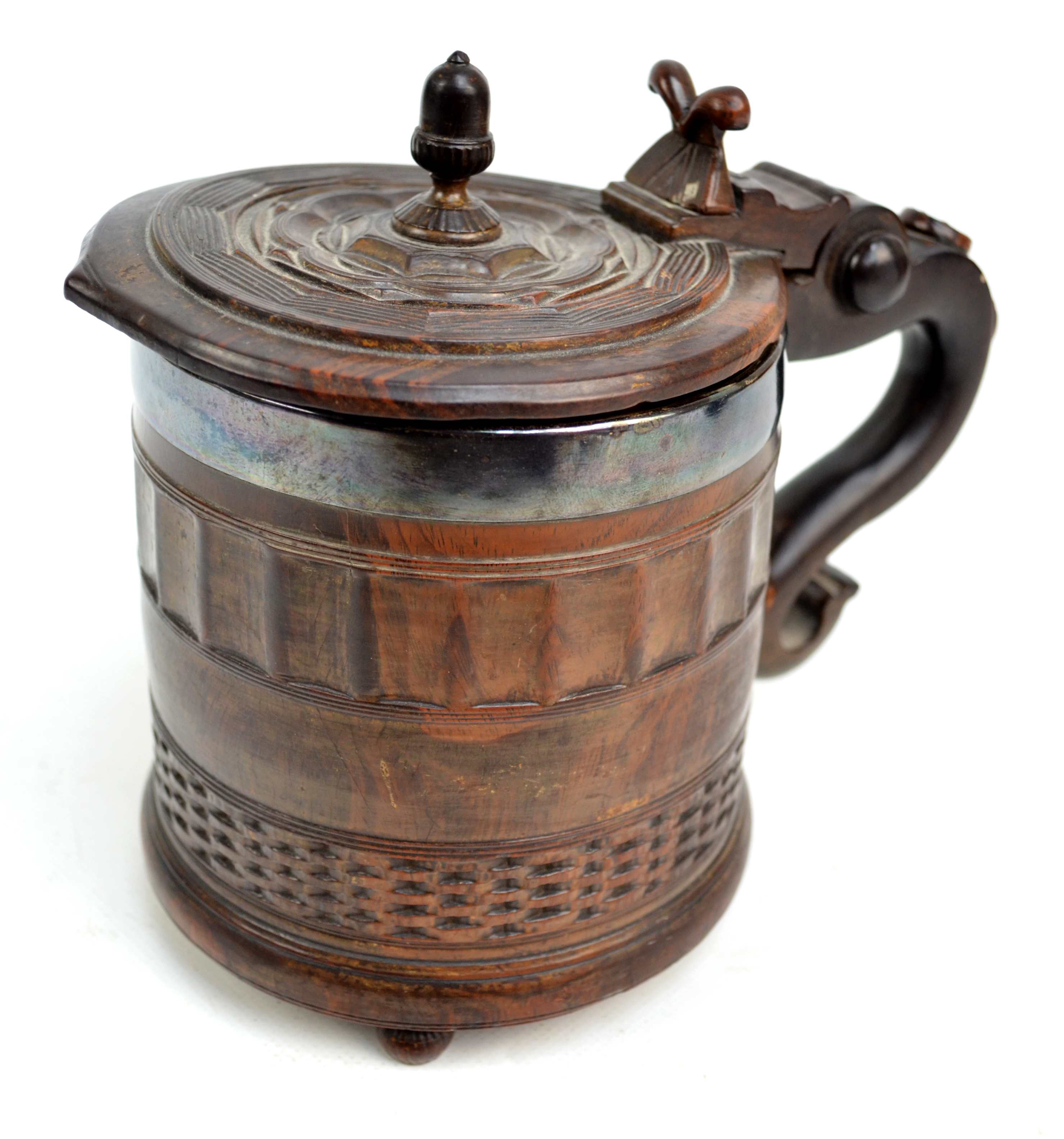 A rare 17th century lignum vitae York tankard. 