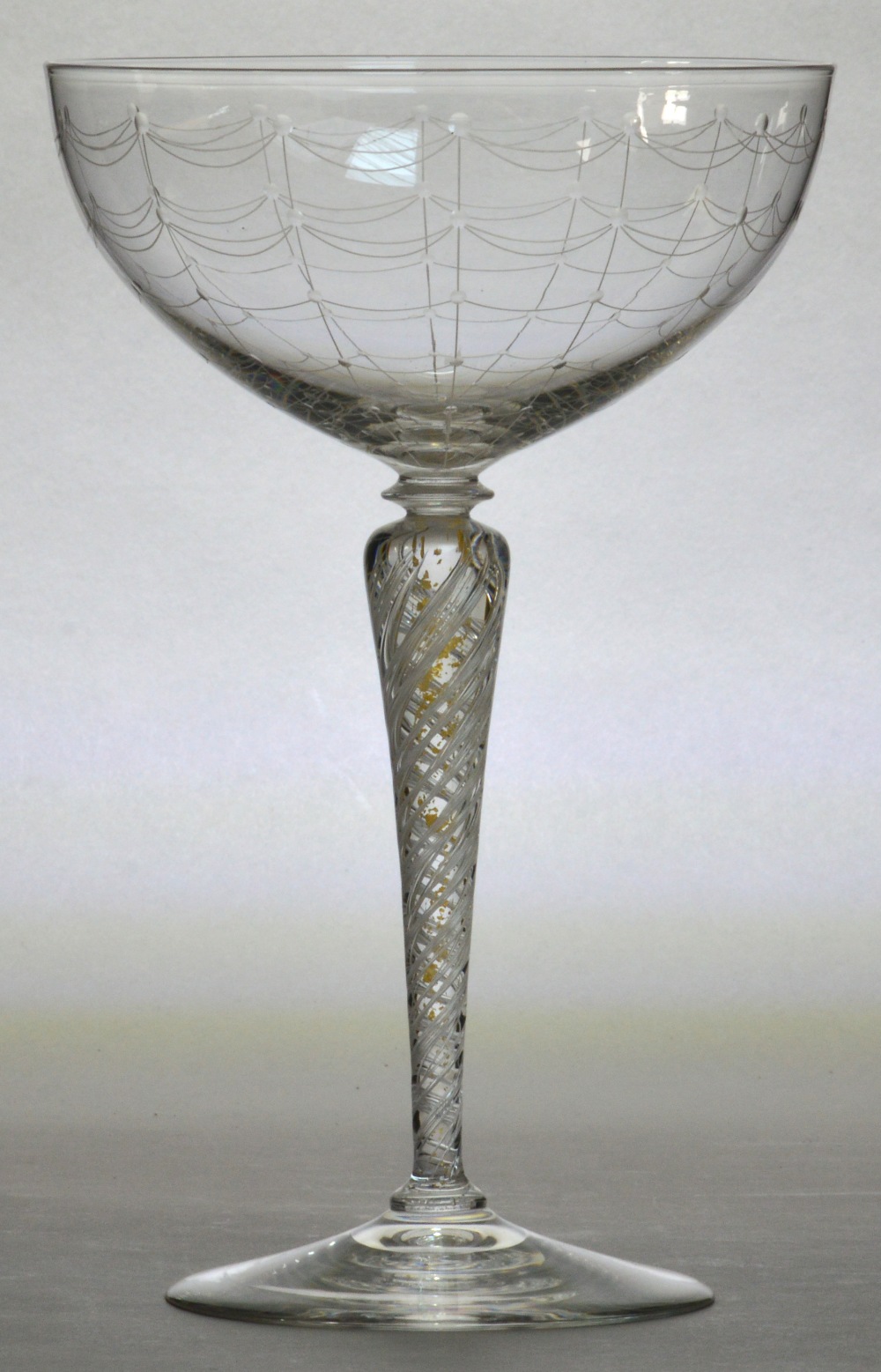 JAMES POWELL WHITEFRIARS; a pedestal shallow bowl with spiders web etched decoration by Hillebauer.