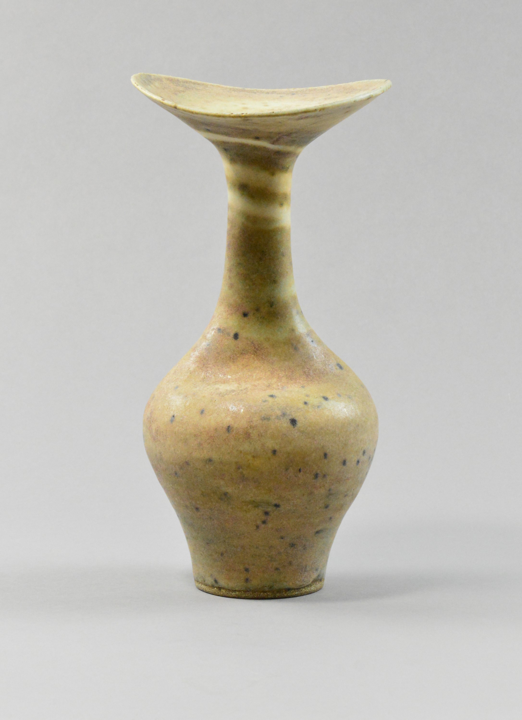 LUCIE RIE (1902-1995); a tall stoneware bottle.